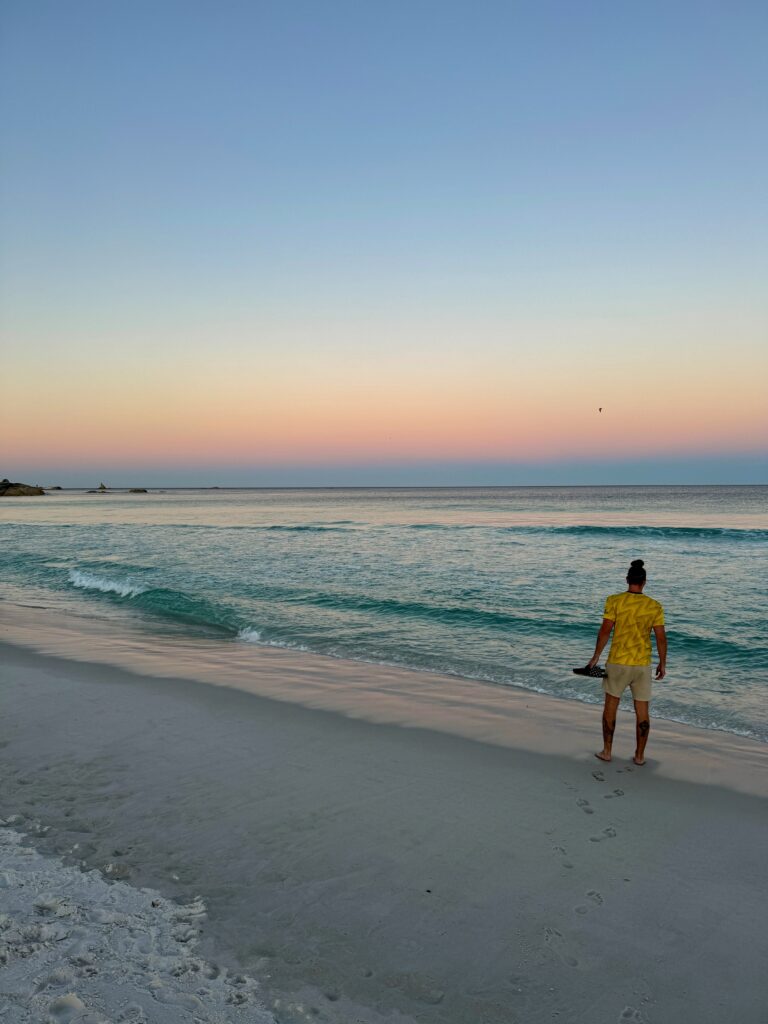 sunset at bay of fires while camping in Tasmania